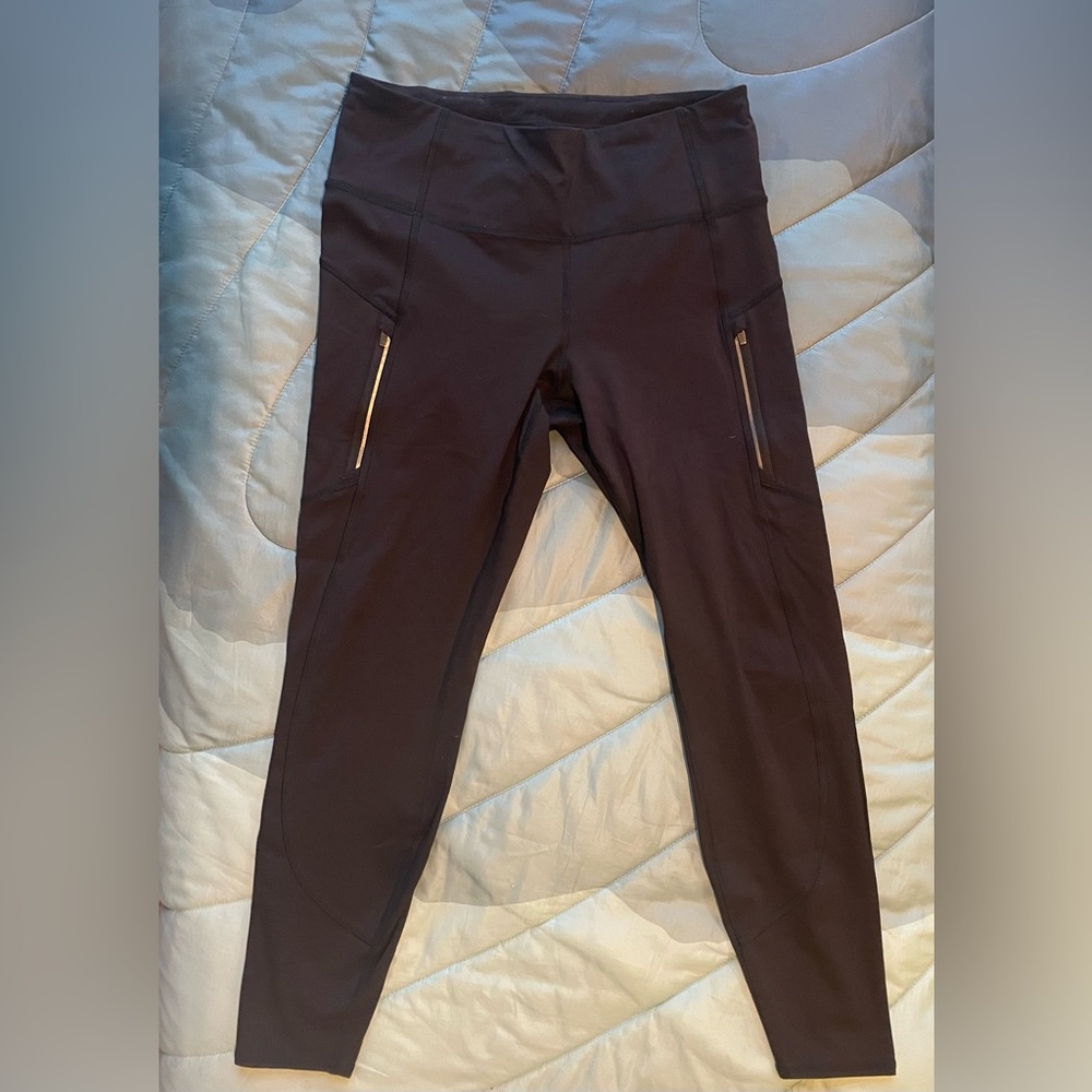 Athleta Black medium tights with Zip Pockets